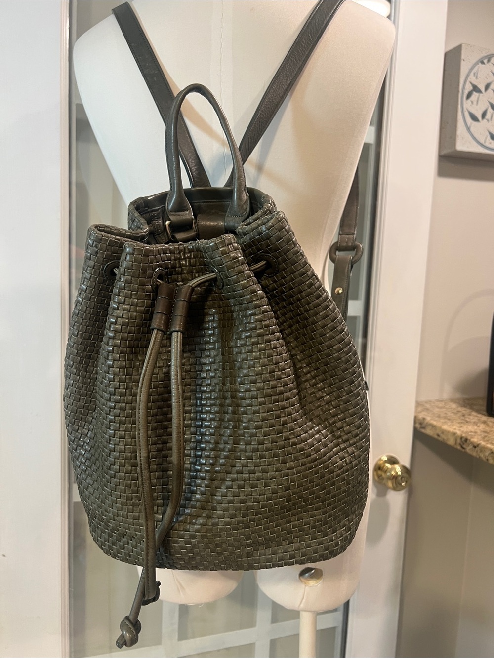 Cole Haan woven leather drawstring back  pack bag